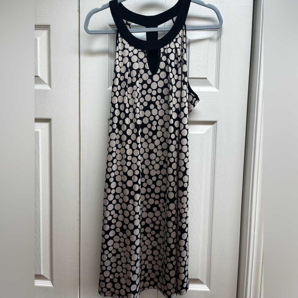 Light weight dress.Keyhole front with open back slats.Polka Dot Patterned Fabric